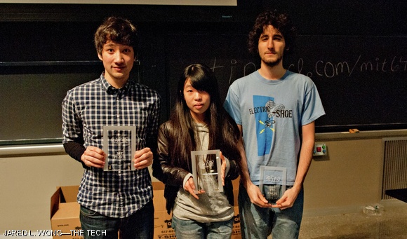 From left; Stephan Boyer ’13, Rachel Fong ’12, and Mark C. Wittels ’13 hold their first place trophies for winning 6.470, the web programming competition, with their project Asler.org last Thursday.
