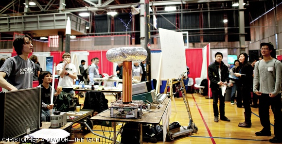 The MIT Electronics Research Society shows off one of their Tesla coils to a crowd of spectators Monday afternoon at the 2012 MIT Techfair. The student-run event had over 60 companies and 30 student groups exhibiting this year.