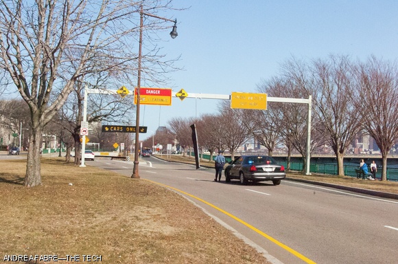 A street sign on Memorial Drive fell as a consequence of the strong winds yesterday. The police were notified to prevent any accidents.