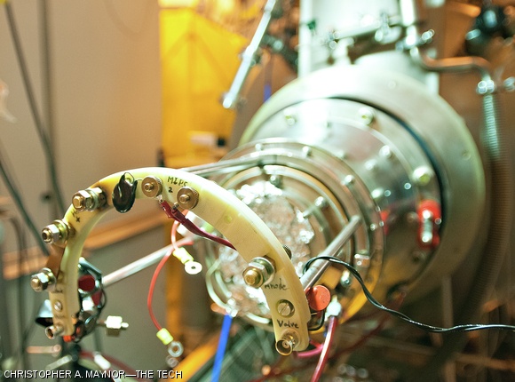 The neutral beam accelerator at the MIT Plasma Science and Fusion Center’s Alcator C-Mod tokamak. The laboratory, centered around the tokamak, or magnetically confined nuclear fusion device, faces significant cuts under the 2013 presidential budget request. The accelerator fires neutral particles into the plasma, resulting in an X-ray emission that can be used to visualize the plasma within and study its behavior.