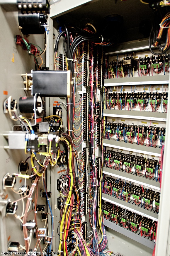 Wiring for the massive alternator, housed in an adjoining building, which provides power to the tokamak during experiments. The alternator, which was donated to the laboratory by Con Edison in 1978 is hooked up to a 75-ton flywheel and provides a peak power of more than 100 megawatts during experiments.