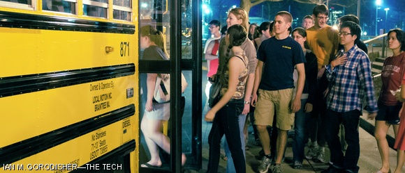 Members of the Class of 2014 board a bus to watch The Hunger Games Thursday night in a class movie trip.