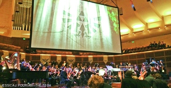 A large screen above the orchestra displayed footage from The Legend of Zelda during the Symphony of the Goddesses at Davies Symphony Hall in San Francisco last Wednesday. Here, before the concert, the screen shows the Royal Crest — the official crest of the royal family of Hyrule.