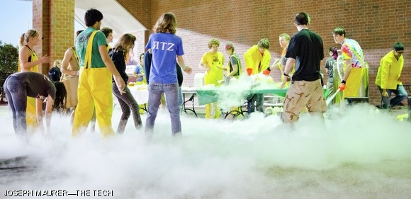 The residents of East Campus Second West make liquid nitrogen ice cream Thursday evening outside of the Z-Center during their annual CryoFAC event. They served several exotic ice cream flavors, including green tea, sea salt, and lemon.