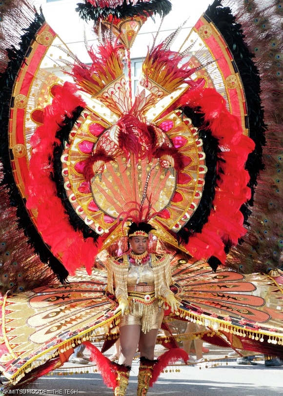 A performer wearing a Trinidad and Tobago-style costume danced during the Cambridge Carnival last Sunday on Main Street near the Kendall T station.