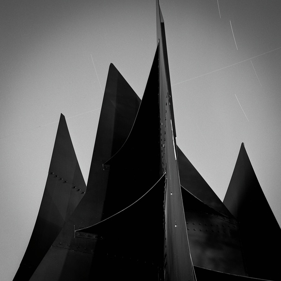 By Nora Vrublevska Alexander Calder’s La Grande Voile (Big Sail) outside the Green Building is one of the modern sculptures seen on campus. The long exposure captures the fine texture of steel and bolts together with star and plane trails in the night sky. Aperture:
ƒ/11 Exposure Time:
16 min. Film:
Fuji Neopan Acros 100 Effective Focal Length:
38 mm (60mm on medium format)