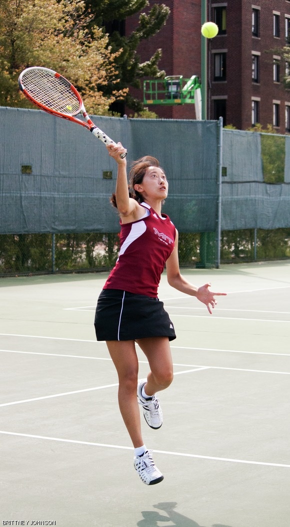 Julia C. Hsu ’14 reaches for a volley in doubles tennis. She and Candace Wu ’13 won the match with a score of 8-2, contributing to an overall 9-0 win for the women’s tennis team last Saturday.