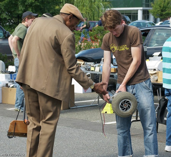 Two men discuss how to fix a motorized drive axle at Swapfest on September 16. The event, a fleamarket for electronic and computer parts, is held on the third Sunday of every month from April to October. It’s is located near the intersection of Albany Street and Main Street.