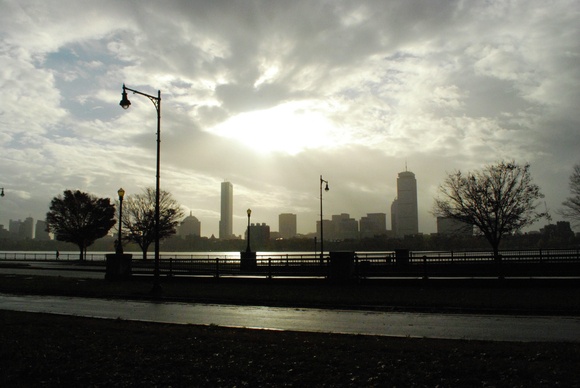 By Emily Kellison-Linn Staff Photographer The bright sunlight provides a dramatic contrast with the dark clouds and the Boston skyline as seen on Tuesday morning. The exposure used tries to find a middle ground and capture the eerie calm after Hurricane Sandy passed. Aperture:
ƒ/20 Exposure Time:
1/2500 sec. Sensitivity:
ISO 1600 Effective Focal Length:
18 mm