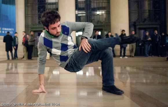 Nicholas A. Pellegrino ’12, a member of the break dance group Imobilare, performs in Lobby 7 during the blackout. Dancers from the group Constructs also performed. Many people, evacuated in the surrounding buildings, stayed in Lobby 7 during the blackout.