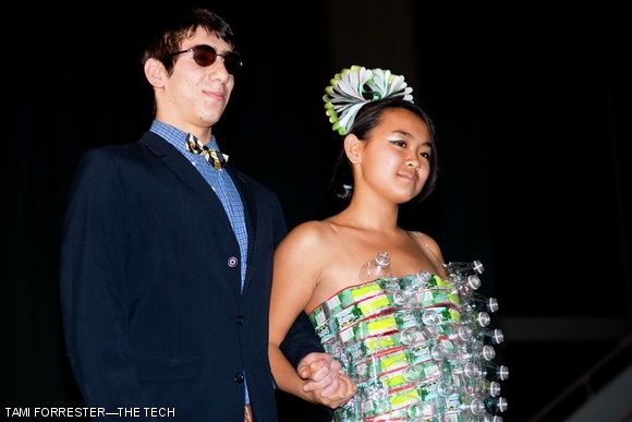 Nancy B. Lu ’16 models a dress made by designer Berj K. Chilingirian ’16 as they walk down the runway together.