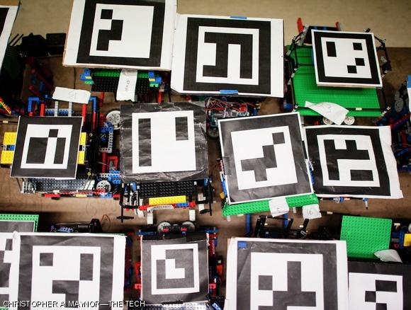 A bar-coded sheet of paper called a “vision code” was placed over each robot as part of the competition’s vision positioning system.