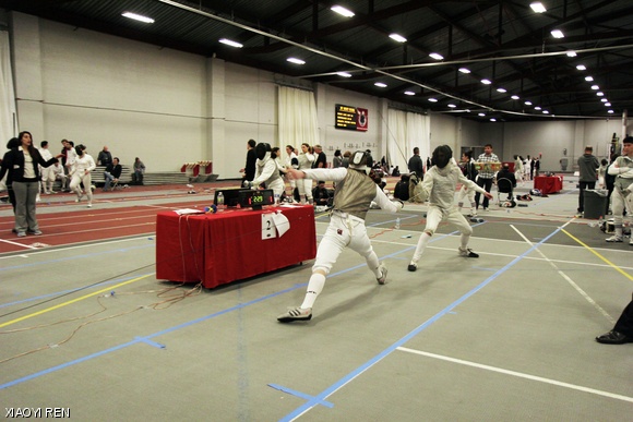 Foilist Alexander E. Siy ’13 makes an attack during a bout at the Eric Sollee Invitational on Sunday, Feb 3.