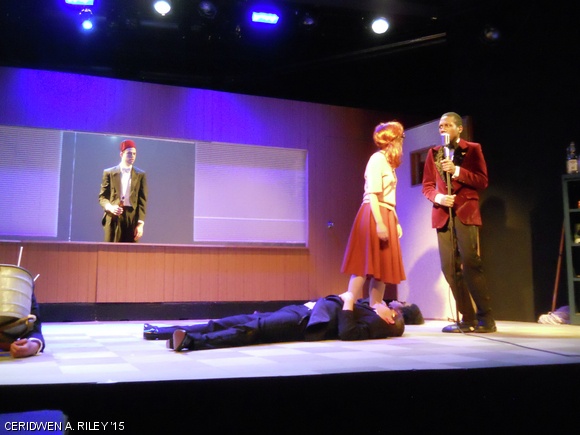 The characters played by Noah M. Arbesfeld ’13, Illan F. Halpern ’13, Cathy T. Zhang ’13, and Johari Frasier ’13 die at a party in Dramashop’s production of Margo Veil.