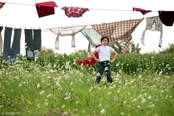 Nine-year-old Clark Kent (Cooper Timberline) in Man of Steel.