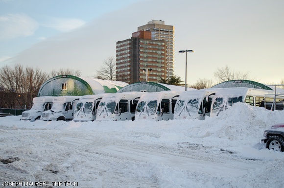 Saferide and Tech Shuttle buses sit idle on Saturday in their parking lot off Albany St. With the Institute shut down during the blizzard, normal shuttle routes were canceled through the weekend.