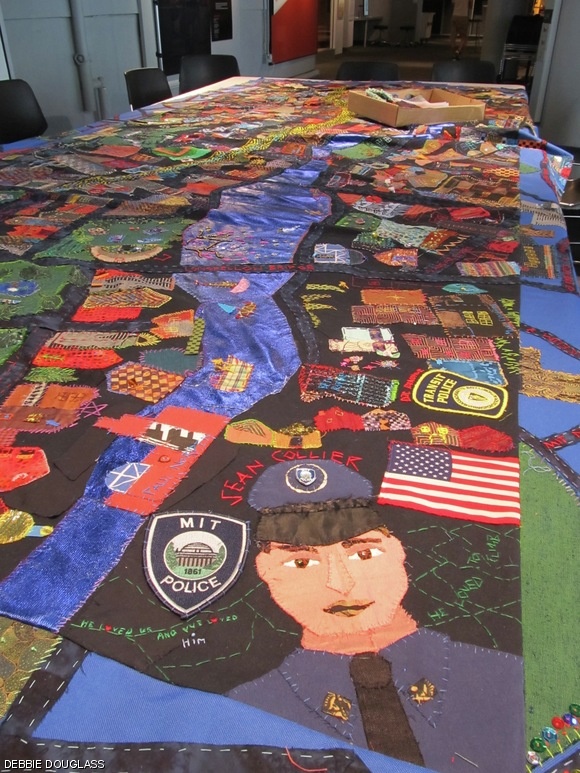 The 12 by 4-foot fabric collage depicting the Charles River, a memorial to the victims of the Boston Marathon tragedy.