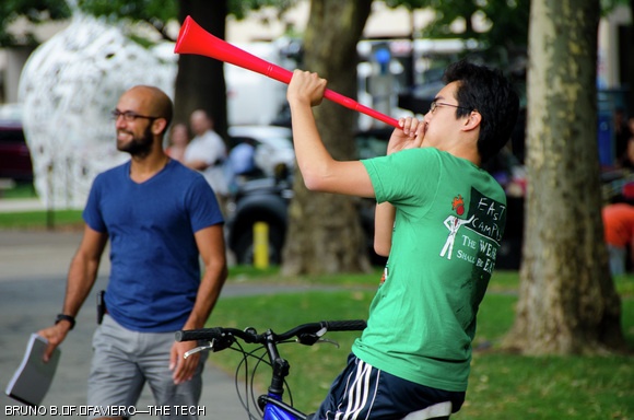An East Campus resident announces their arrival by blowing a vuvuzela.