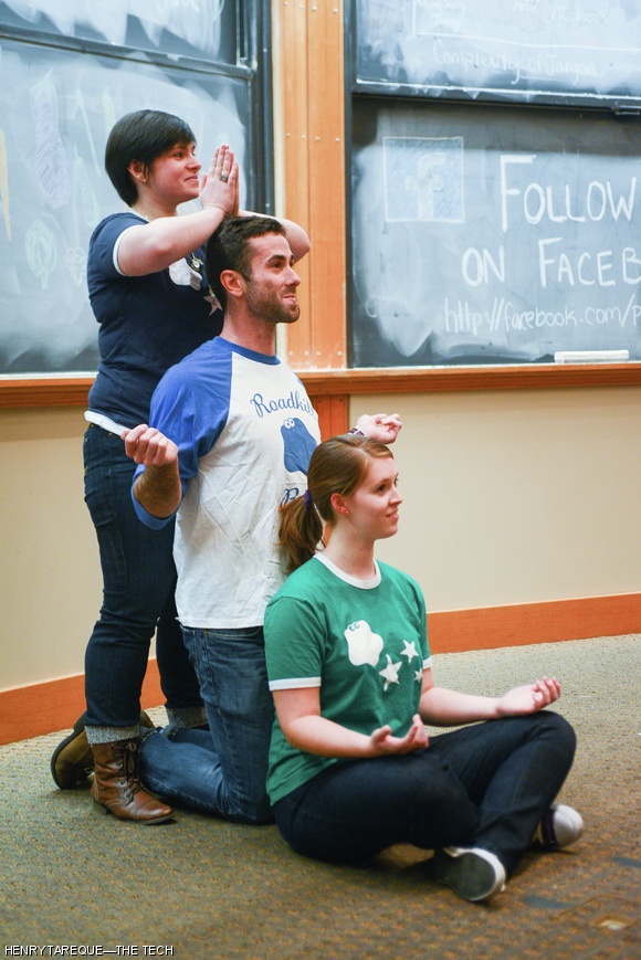 From left to right, Emma L. Frank ’15, Henry A. Fingerhut G, and Tasha L. Schoenstein ’16 perform before a packed audience in 6-120 during Roadkill Buffet’s improv comedy show on Friday, Oct. 25.