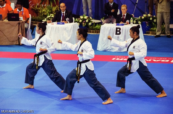 Michelle W. Chen ‘14, Carissa Fu (Boston University), and Miyako Yerick (University of Texas at Austin) compete in the Eighth World Taekwondo Poomsae Championships held on October 31 in Bali, Indonesia. The three athletes represented the U.S. Female Under 29 team, and placed eighth out of 17 teams at the prestigious competition.
