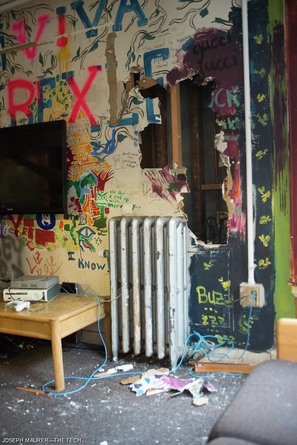A hole in the wall of Bexley Hall’s entry 50 was part of vandalism that happened in the now-closed dorm. Bexley will be undergoing extensive renovations for up to the next three years.