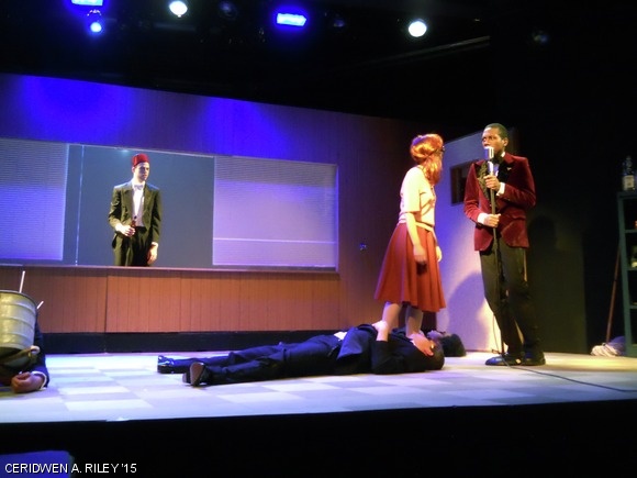 The characters played by Noah M. Arbesfeld ’13, Illan F. Halpern ’13, Cathy T. Zhang ’13, and Johari Frasier ’13 die at a party in Dramashop’s production of Margo Veil.