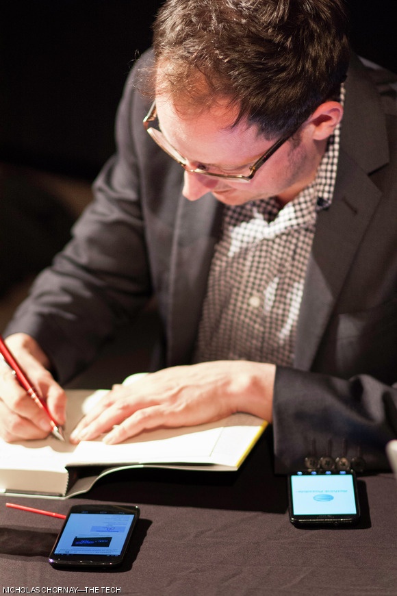 Nate Silver signed copies of his New York Times bestselling book The Signal and the Noise for audience members following his talk. Many audience members brought their own copies, but the book was also offered for sale outside the auditorium, providing a small consolation for attendees who were unable to get seats inside.