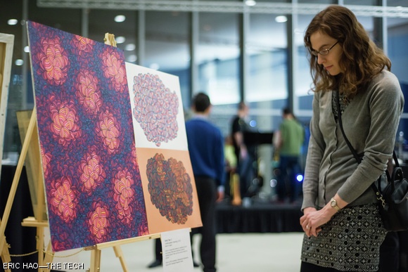 An attendee examines “Untitled Drawings” by Emily W. Tow G at the Graduate Arts Soiree on the evening of Friday, March 14. Guests were greeted on the sixth floor of the Media Lab with over 30 works of art as well as performances by a live band.