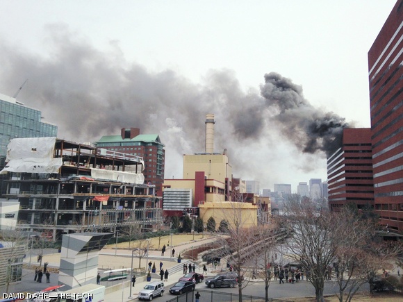Dark clouds of smoke billowed from a two-alarm fire atop E90 in Kendall Square last Friday afternoon. Cambridge firefighters quickly extinguished the fire with no injuries reported.