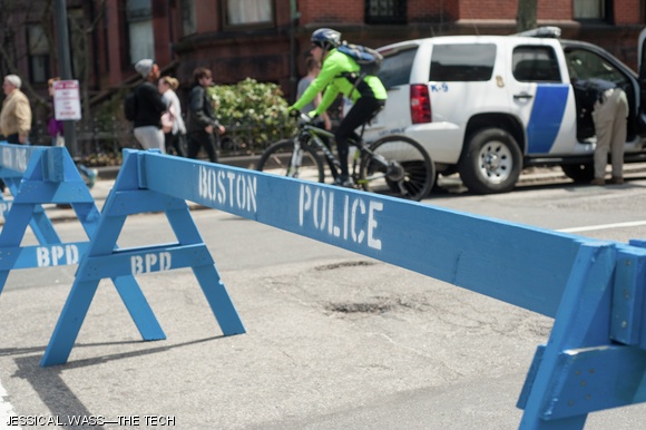 There was a heavy police presence at the Boston Marathon this year. Security checkpoints to get near the finish line were established, and many roads were blocked with police barriers and public works trucks.