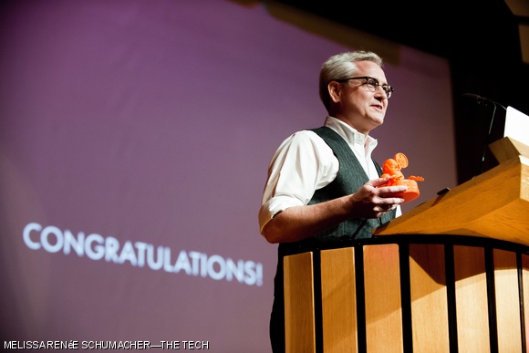 Michael Anderson accepts his Darwin statue on Sunday night at BAHFest East, which was held at Kresge for the second year in a row. Six presenters defended their favorite Bad Ad hoc Hypotheses (BAH) explaining a certain phenomenon as being a result of evolutionary adaptation. Anderson was chosen by a combination of judges’ votes and audience applause. In addition to the doubtful looking Darwin, Anderson took home a $500 prize.