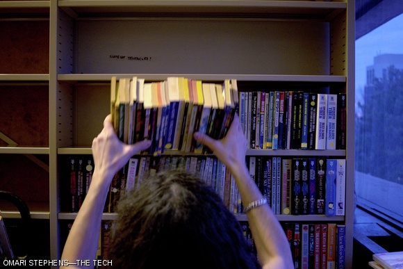 As part of an effort to consolidate the paperback section, James K. Hobin ’16 re-shelves an armful of books. It is estimated that MITSFS circulates around 46,000 books, not including the 4,000 reserve books which can be read in the library.