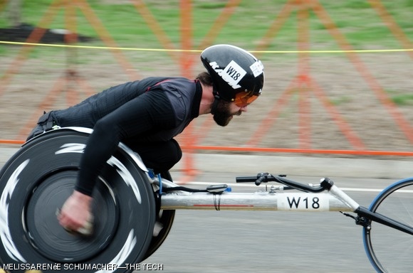 Aaron L. Pike of Champaign, Illinois, races in the 119th Boston Marathon.