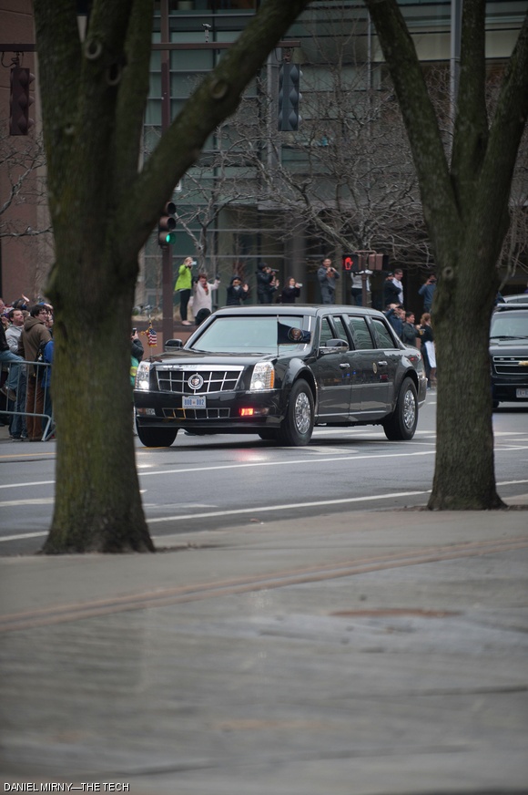 The Presidential Motorcade drives past the Whitehead Institute on Monday. President Barack Obama and First Lady Michelle Obama stopped at Area Four for lunch following the opening of the new Edward M. Kennedy Institute for the United States Senate in Boston.